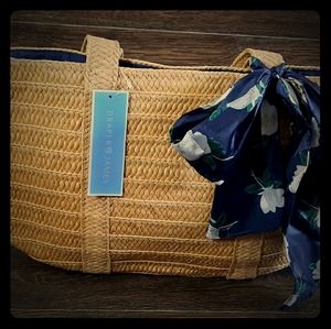 Draper James straw bag with detachable silk scarf.